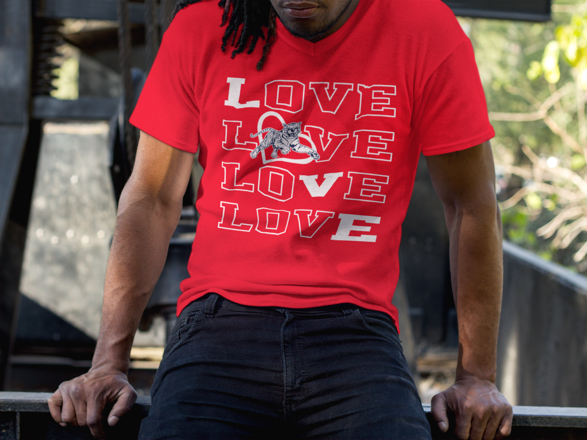 Red v-neck short-sleeve T-shirt on model, stacked LOVE graphic with tiger detail