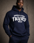 Man wearing a navy hoodie with 'Jackson State Tigers 1877' text against a gray background