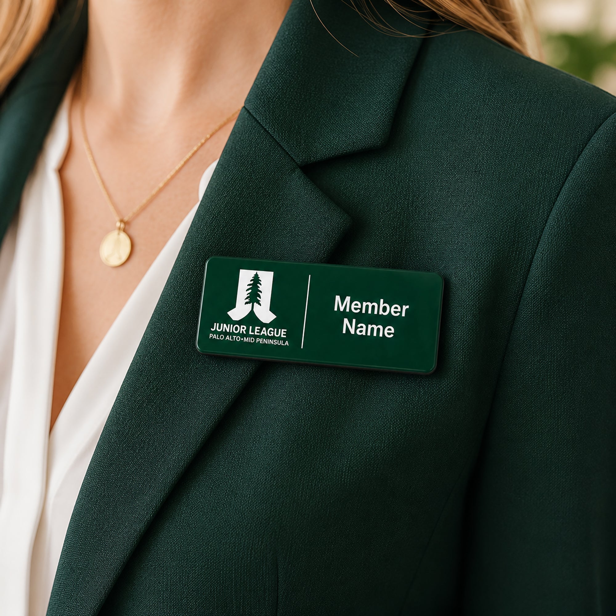 Junior League Palo Alto Mid Peninsula custom laser engraved green acrylic name badge worn on green blazer lapel showing professional lifestyle styling