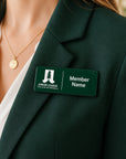Junior League Palo Alto Mid Peninsula custom laser engraved green acrylic name badge worn on green blazer lapel showing professional lifestyle styling