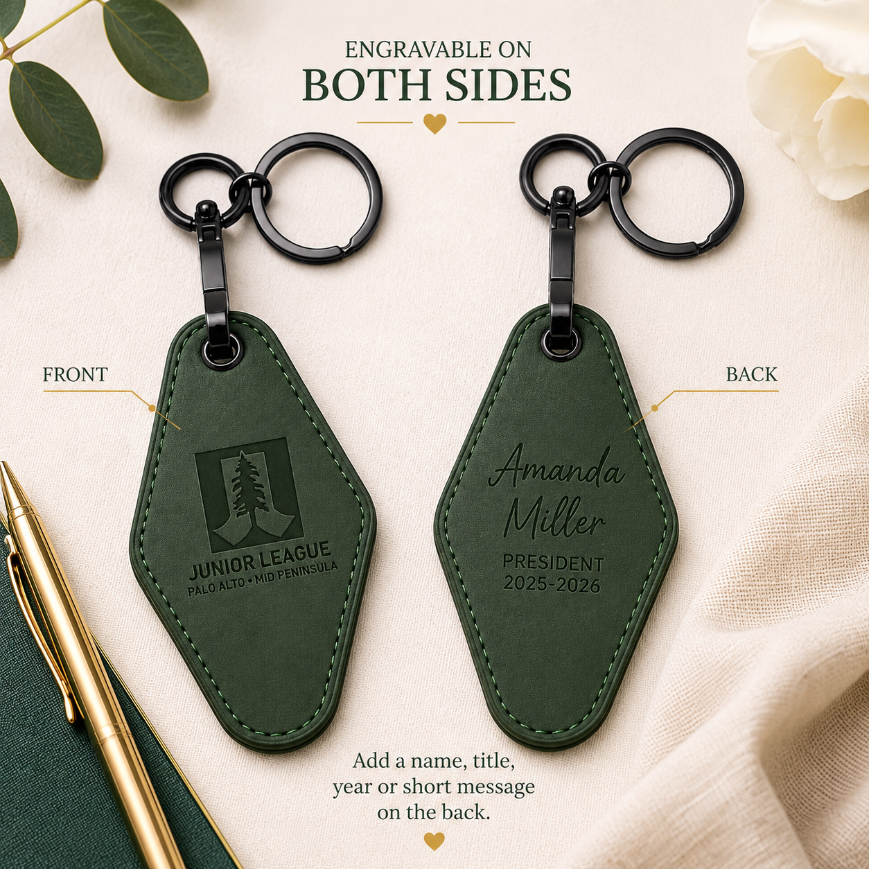 Luxury green Junior League motel keychain styled with notebook, gold pen, and keys in an elevated lifestyle flat lay