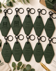 Bulk collection of personalized Junior League executive motel keychains with engraved officer titles and member names