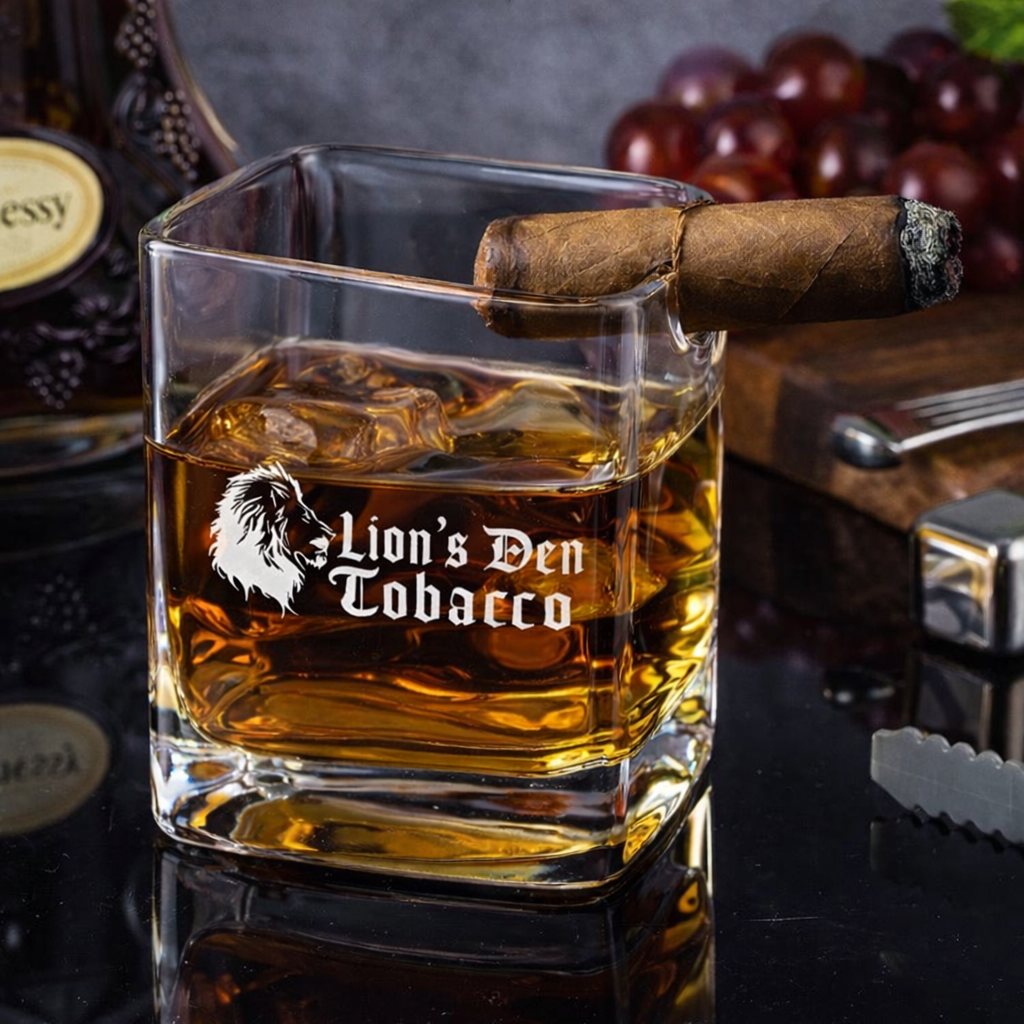 Custom Lion’s Den Tobacco engraved side by side whiskey glass for cigar lounges, premium barware, and whiskey and cigar enthusiasts.