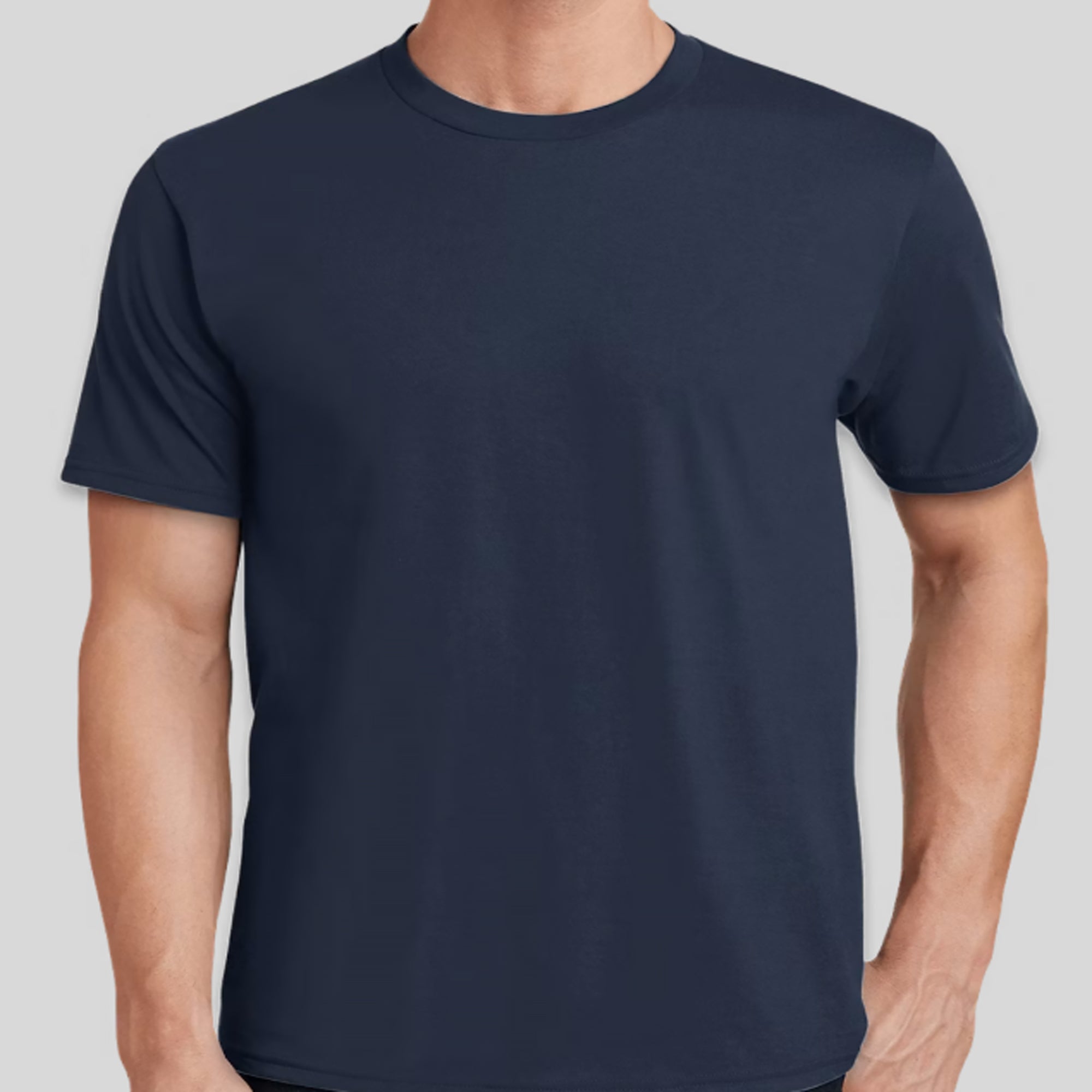 Navy blue t-shirt worn by a person on a light gray background