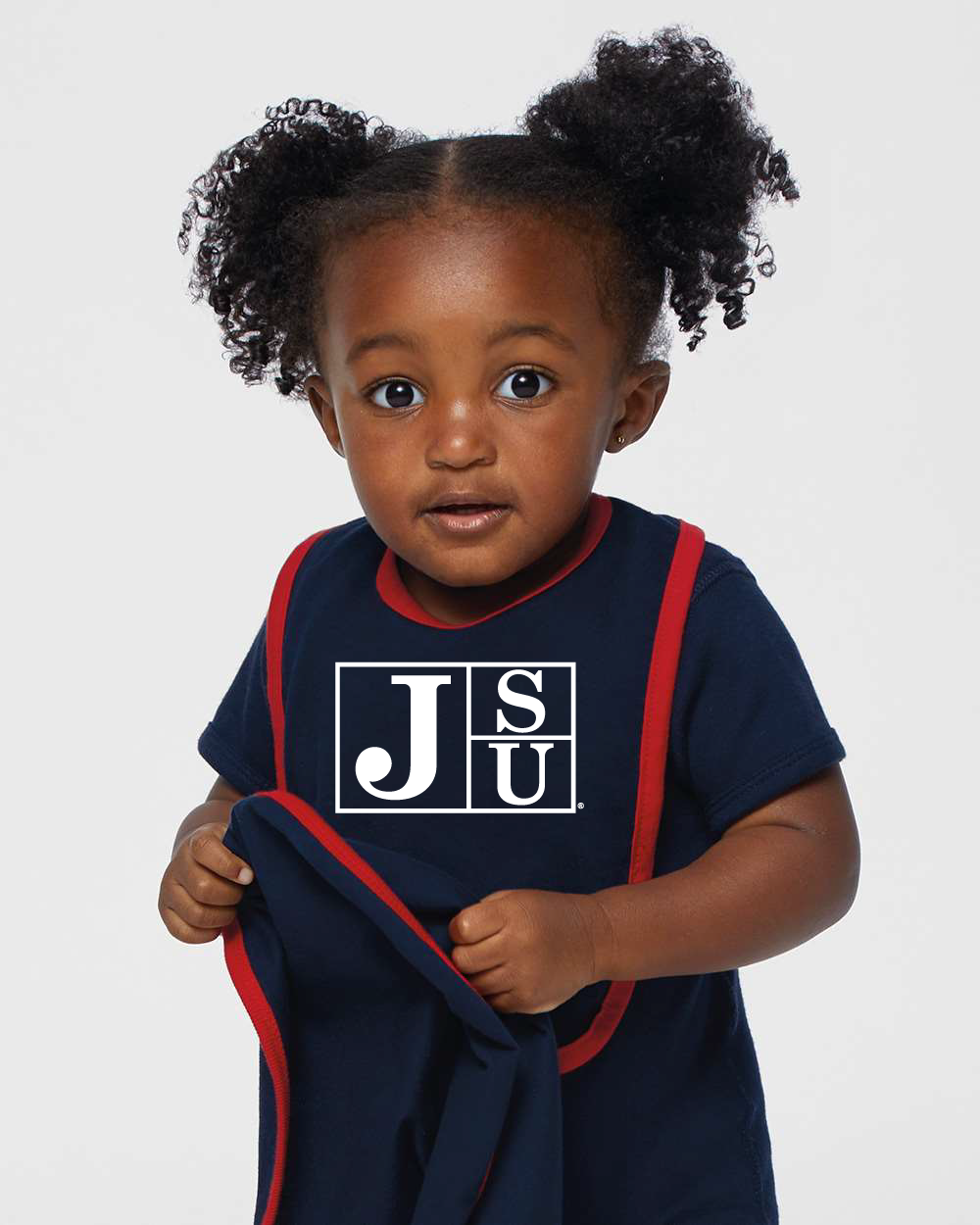 Infant bib on baby in navy blue with white JSU block letter logo