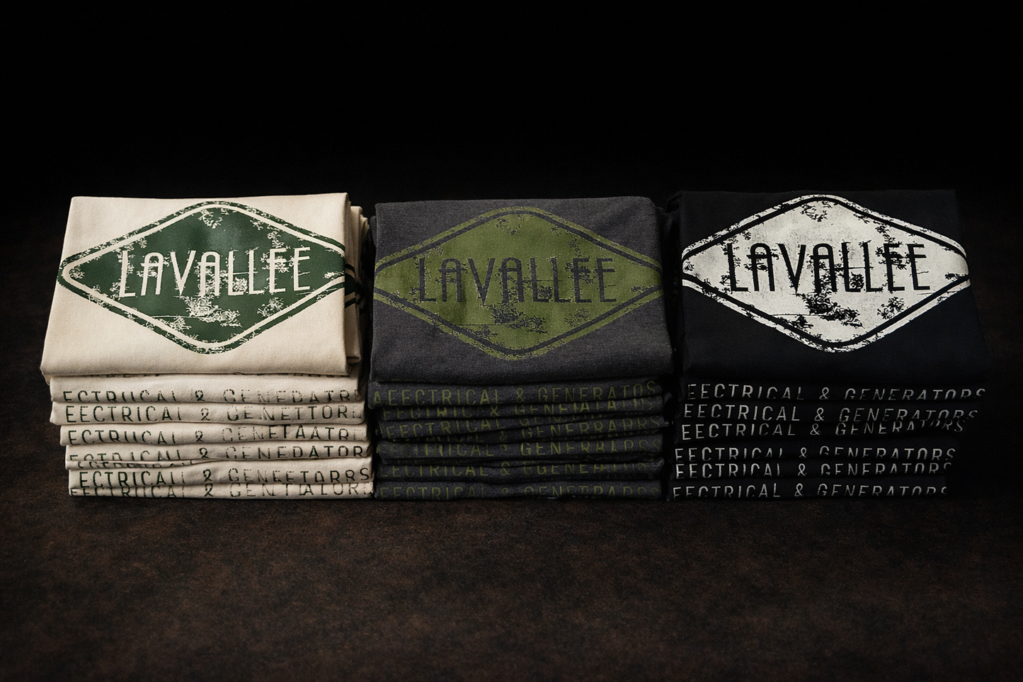 Stacks of towels with 'Lavallee' branding on a dark background