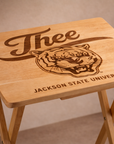 Light wood folding tray table with engraved “J’thee” script, tiger crest, and Jackson State University