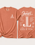 Junior League Women Who Build Comfort Colors 1717 t-shirt in terracotta featuring a white front chest logo and oversized empowerment graphic on the back