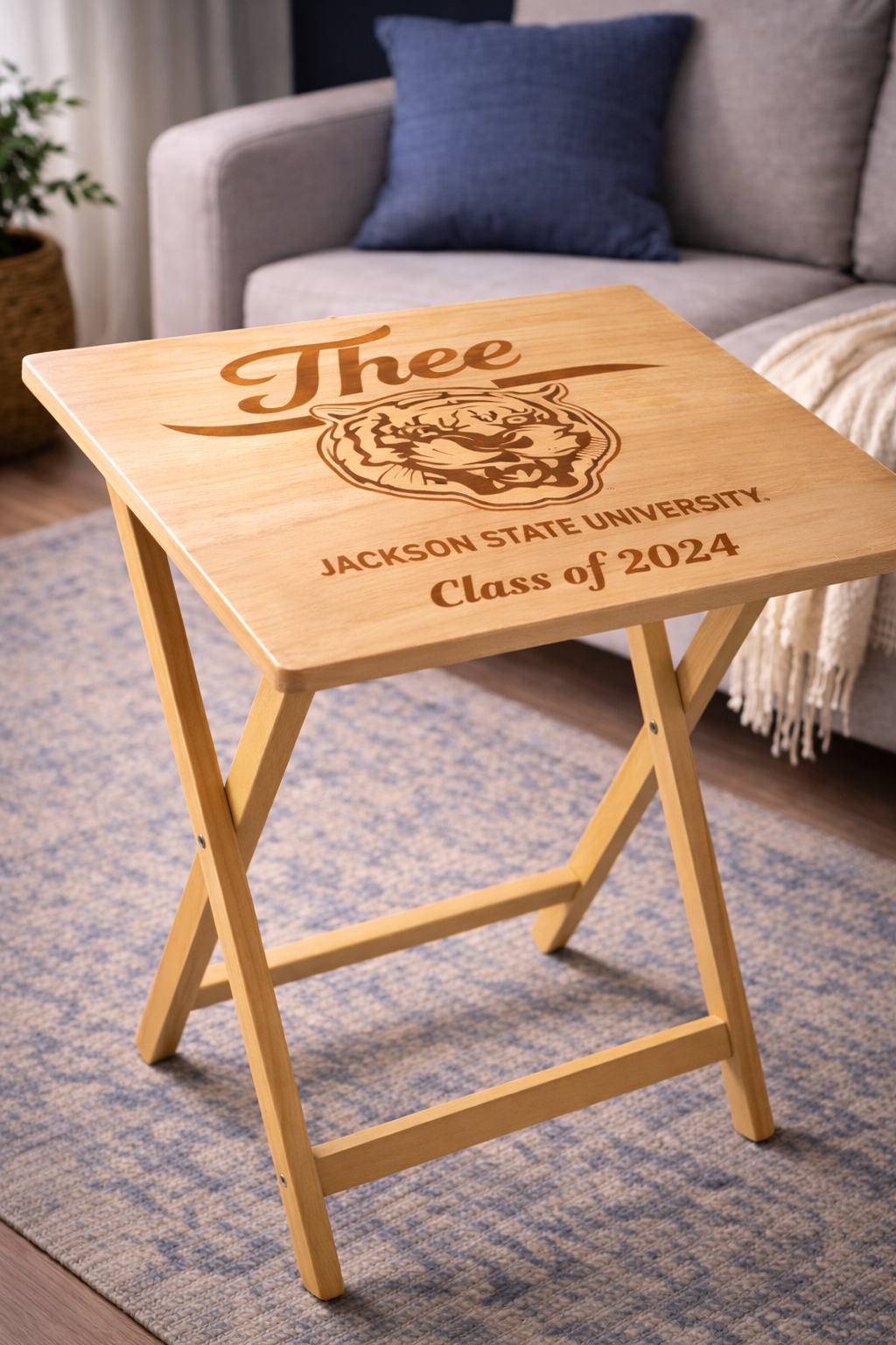 Light wood folding tray table with engraved “J’thee,” tiger crest, and “Class of 2024”
