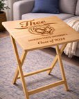 Light wood folding tray table with engraved “J’thee,” tiger crest, and “Class of 2024”
