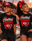 Youth models wearing black Clinton Arrows graffiti T-shirts at a football stadium