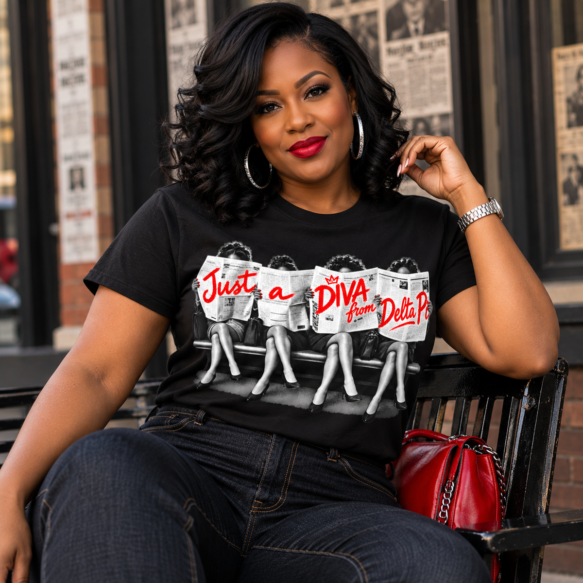 Black woman wearing the Just A Diva from Delta Pi black short sleeve T-shirt