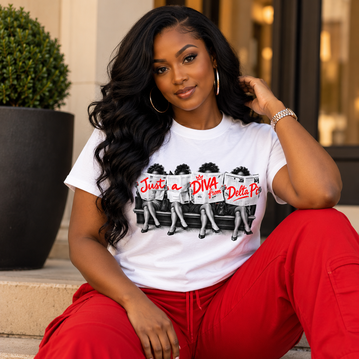 Black woman wearing the Just A Diva from Delta Pi white short sleeve T-shirt