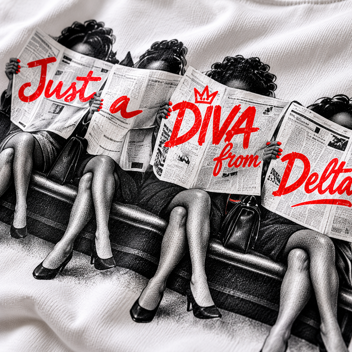 Close-up detail of Just A Diva from Delta Pi newspaper halftone and red print on white apparel
