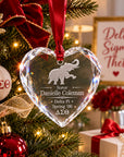 Laser engraved crystal heart ornament displayed on an elegant Christmas tree.