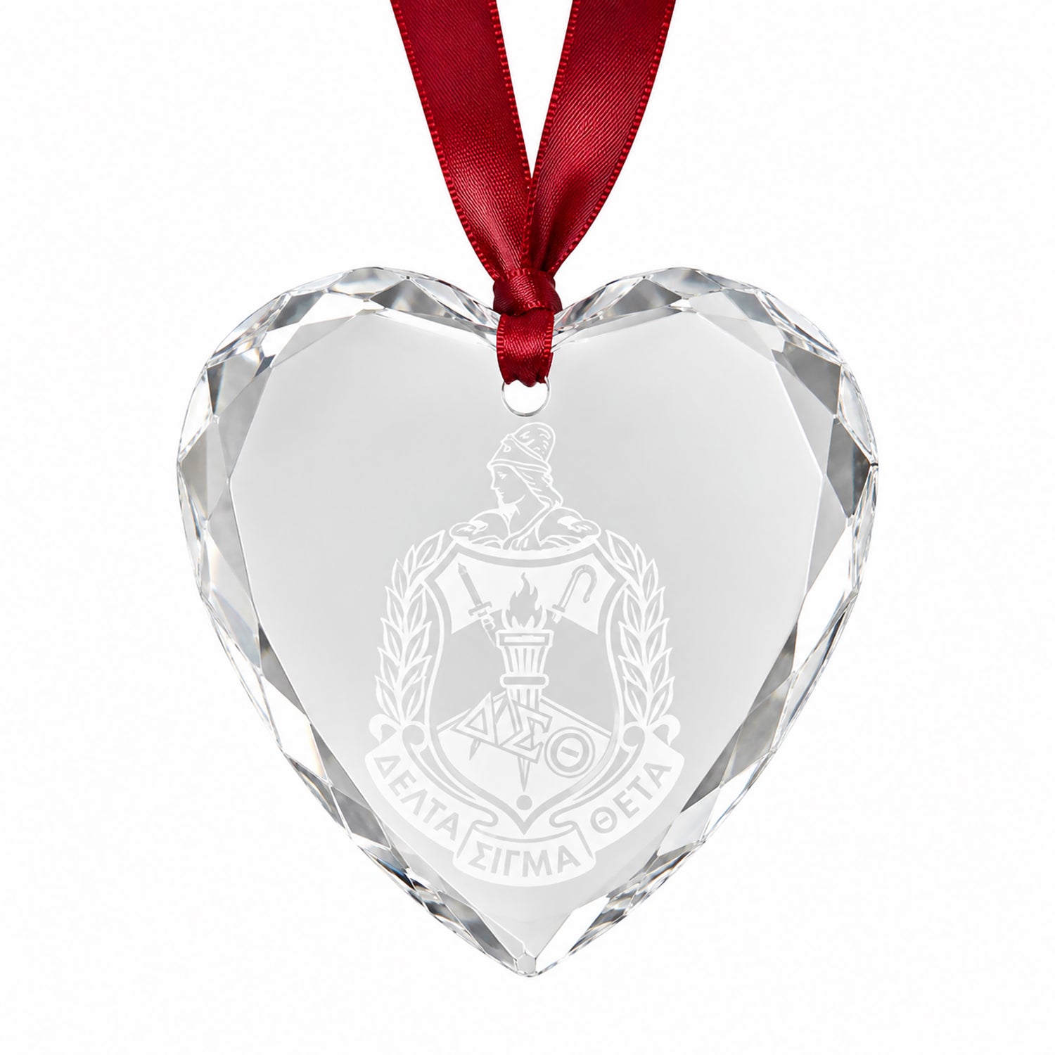 Officially licensed Delta Sigma Theta engraved crystal heart keepsake with shield design.