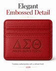 Classic Crimson Delta Sigma Theta faux leather slim wallet with embossed Greek letters on the front.