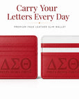 Officially licensed Delta Sigma Theta faux leather slim wallets in Classic Crimson and Crimson & White featuring embossed Greek letters.