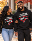 Black adults wearing I Understood the Assignment I Voted crewneck sweatshirt and hoodie
