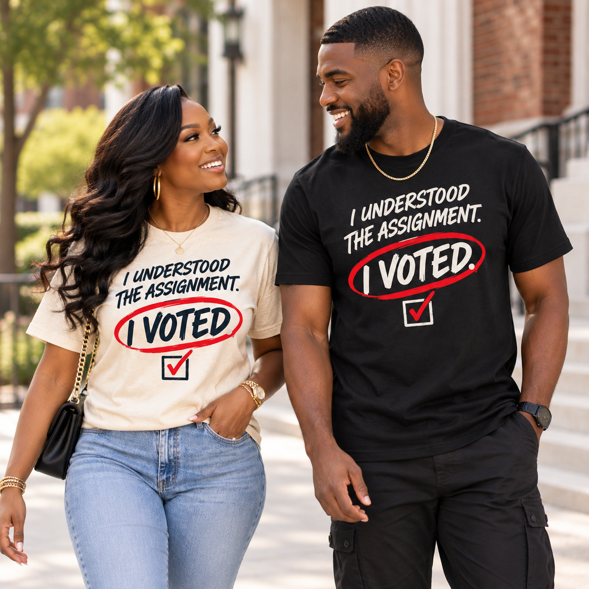 Black adults wearing I Understood the Assignment I Voted T-shirts