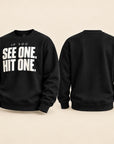 Black crewneck sweatshirt shown from both front and back views. The front features the bold white text 'IF YOU SEE ONE, HIT ONE.