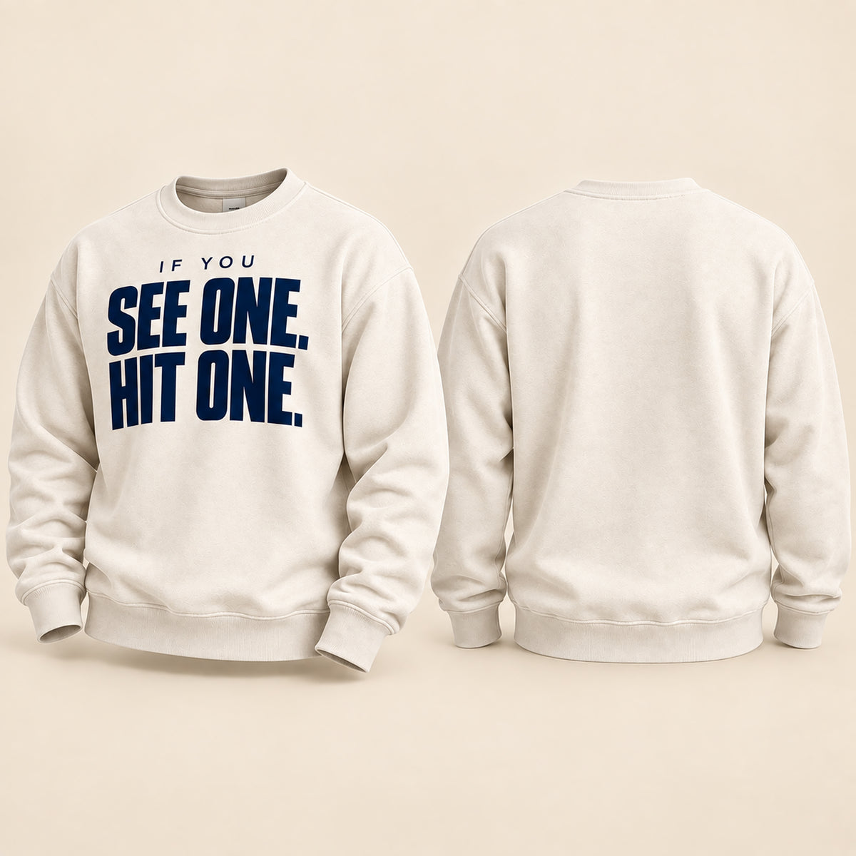 An off-white crewneck sweatshirt shown from both the front and back. The front features the text 'IF YOU SEE ONE, HIT ONE.