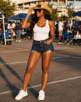 Jackson State University female fan wearing JSU cowboy straw hat on game day
