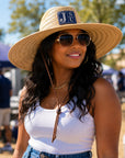 Woman wearing Jackson State JSU wide brim straw lifeguard hat with navy blue and silver leatherette patch