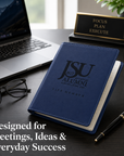 Jackson State University Life Member journal on a modern executive desk.