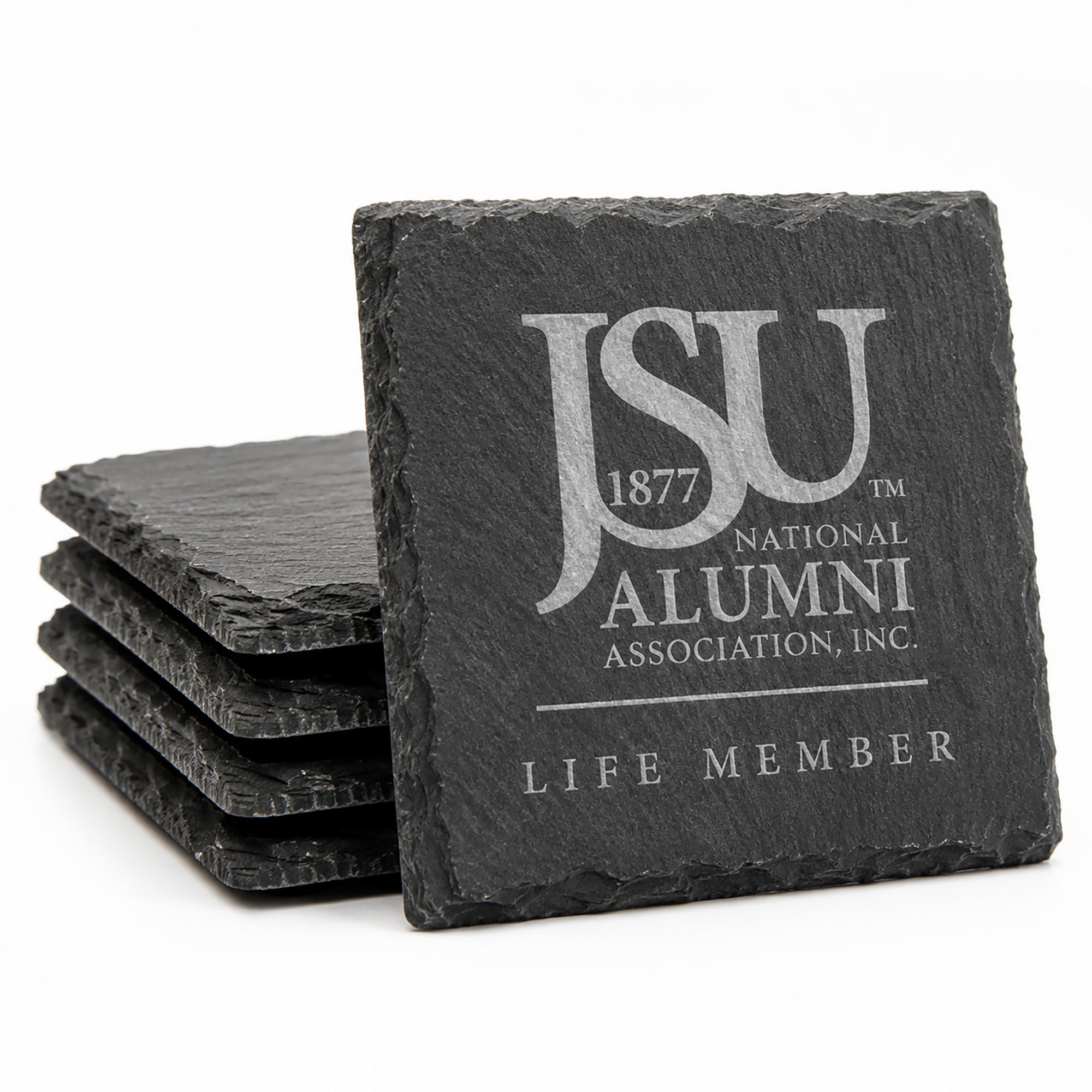 Set of four square engraved Jackson State University Life Member slate coasters featuring the official JSU National Alumni Association logo on natural charcoal slate.