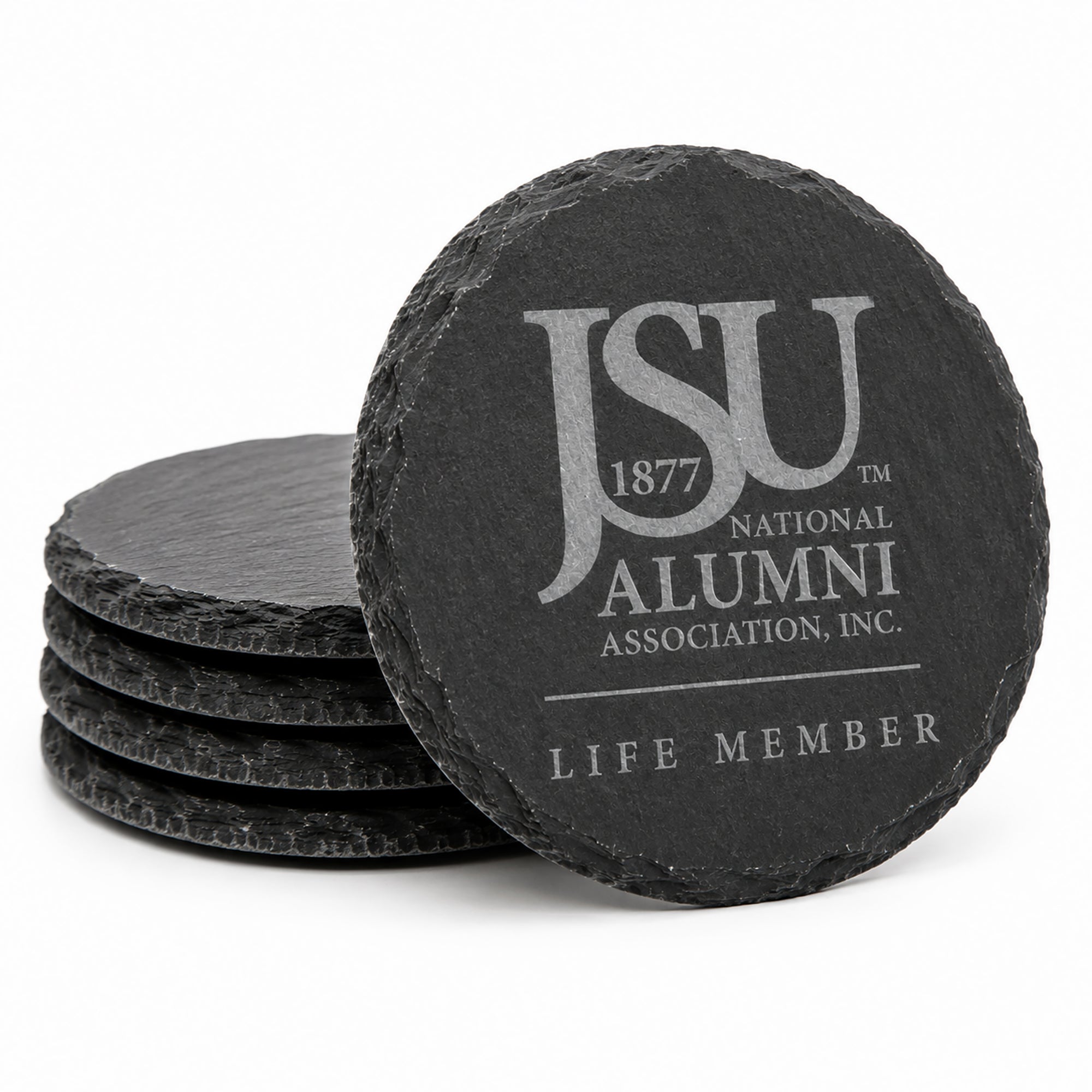 Set of four round engraved Jackson State University Life Member slate coasters featuring the official JSU National Alumni Association logo on natural charcoal slate.