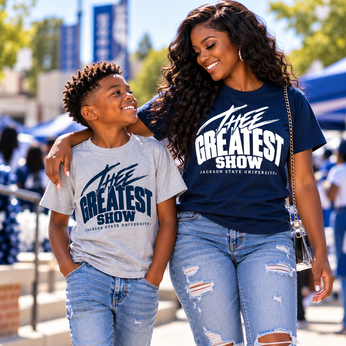 Adult and child wearing Jackson State Tigers Thee Greatest Show T-shirts