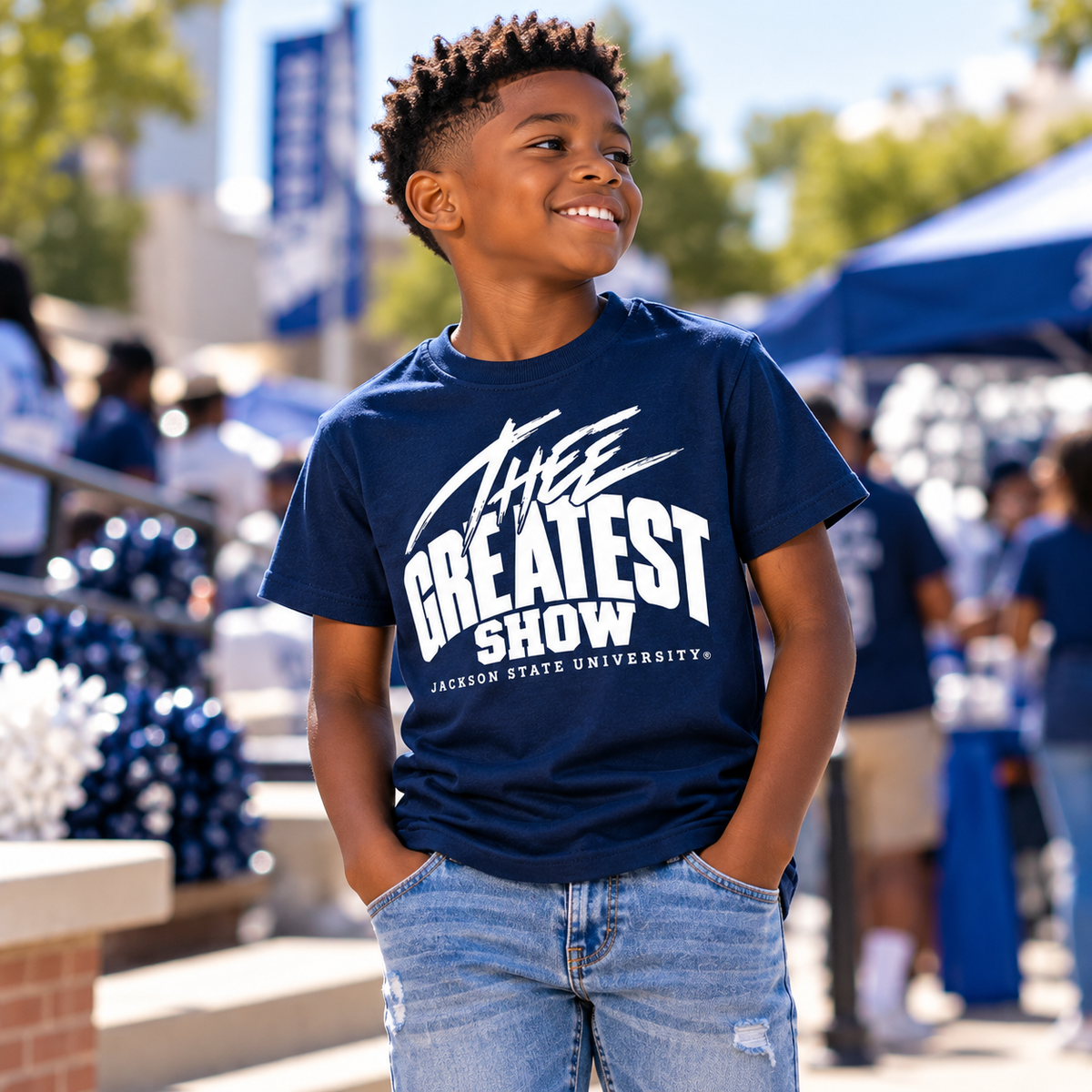 Boy wearing Jackson State Tigers Thee Greatest Show navy youth T-shirt