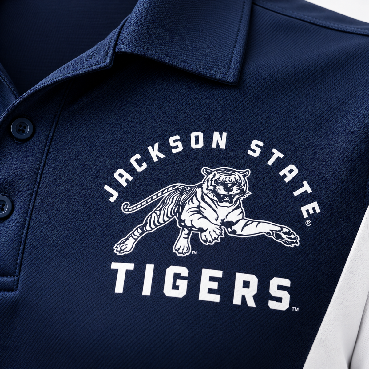 Jackson State Tigers leaping tiger white left chest design on True Navy performance polo