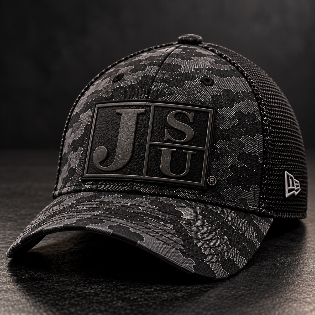 Jackson State Black Camo New Era 39THIRTY Stretch Tech Mesh cap with tone-on-tone black Block JSU leatherette patch