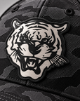 Close-up of Tiger Head black-to-silver leatherette patch on Jackson State Black Camo New Era 39THIRTY cap