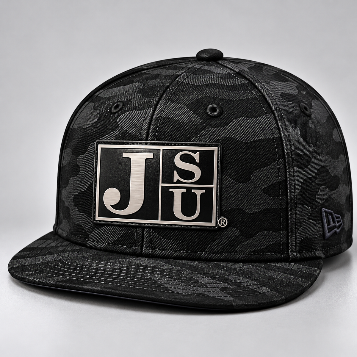 Jackson State Black Camo New Era 9FIFTY flat bill snapback with Block JSU black-to-silver leatherette patch