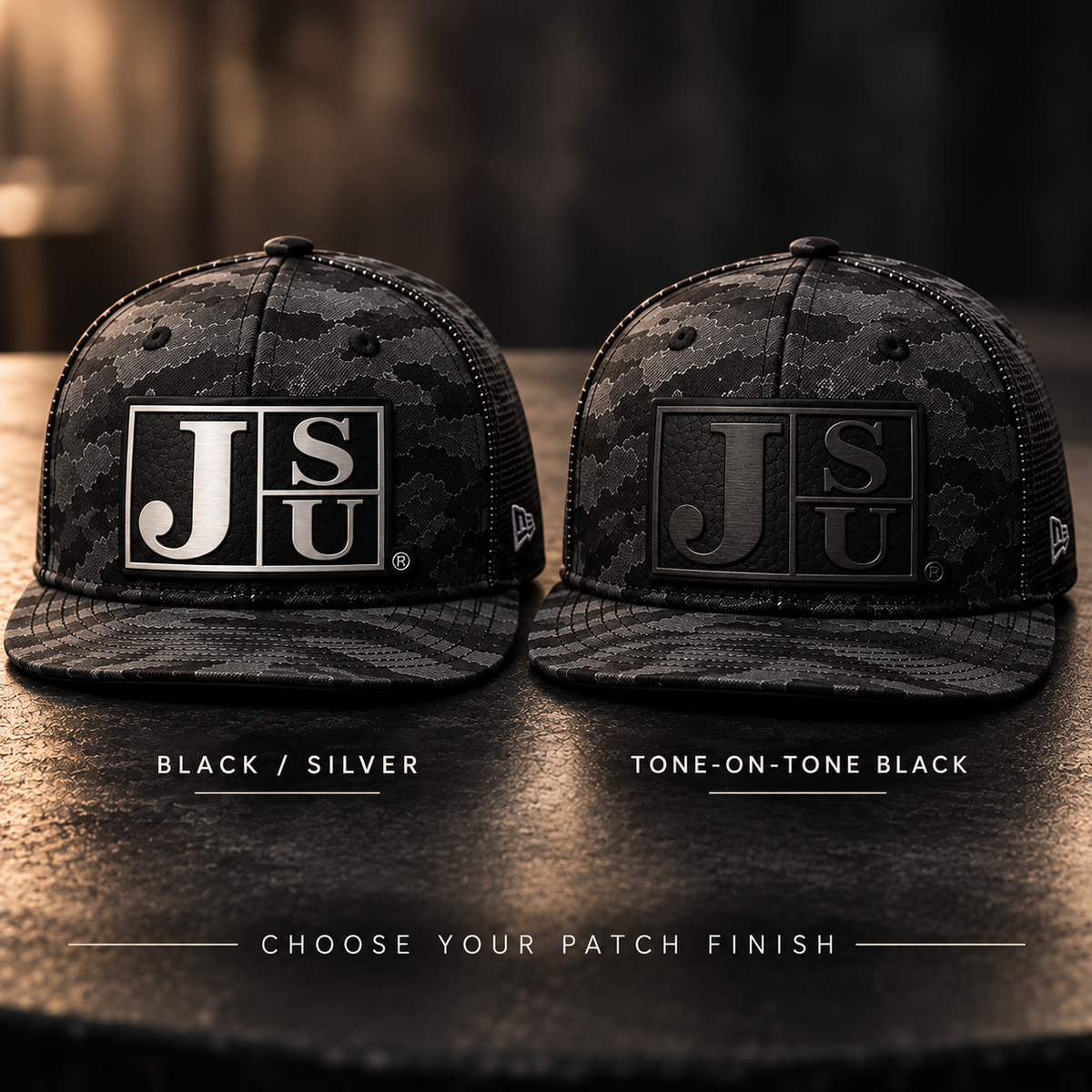 Jackson State Black Camo New Era 9FIFTY hats comparing Black Silver and Tone-on-Tone Black Block JSU leatherette patch finishes