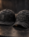 Jackson State Black Camo New Era 9FIFTY and 39THIRTY hats with tone-on-tone black Block JSU and Tiger Head leatherette patches