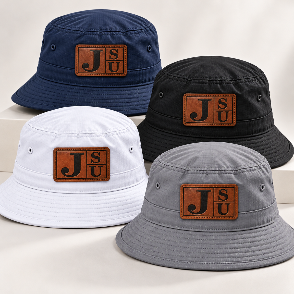 Jackson State Tigers outdoor bucket hats in Dress Blue Navy black white and gray with walnut leatherette JSU patches
