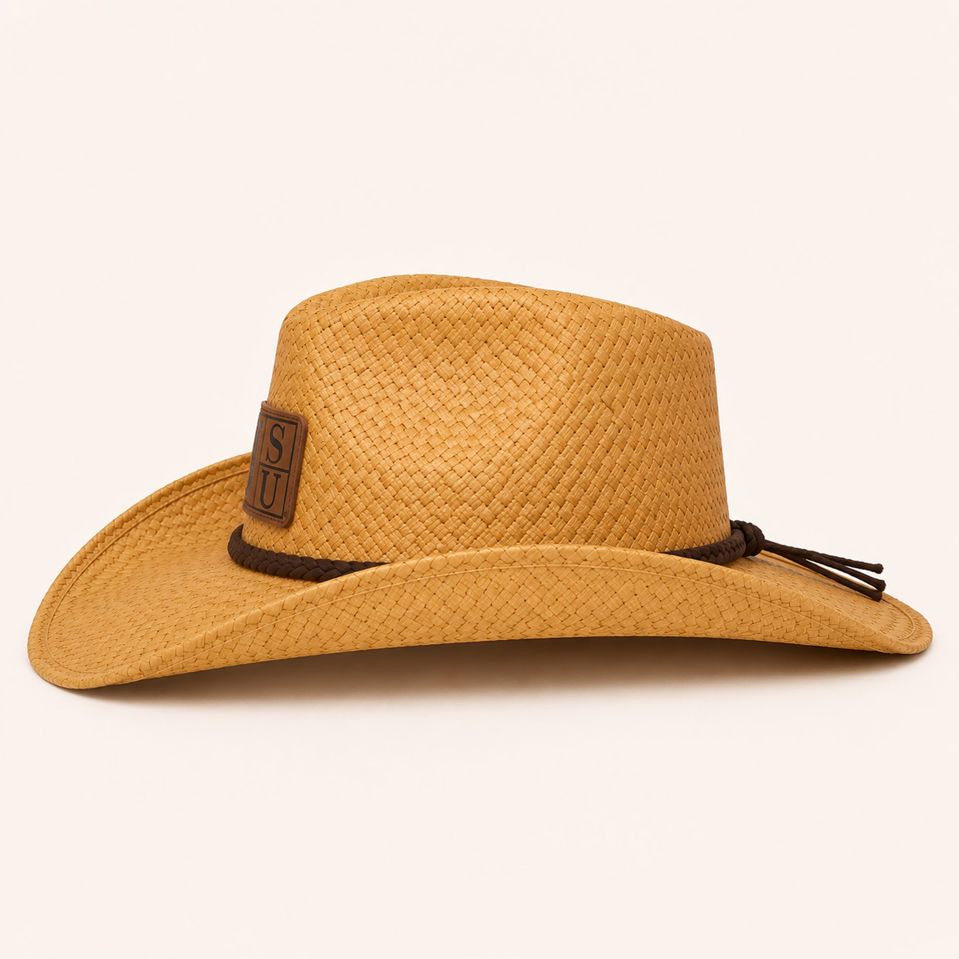 Side view of Jackson State natural raffia cowboy straw hat with braided leather band