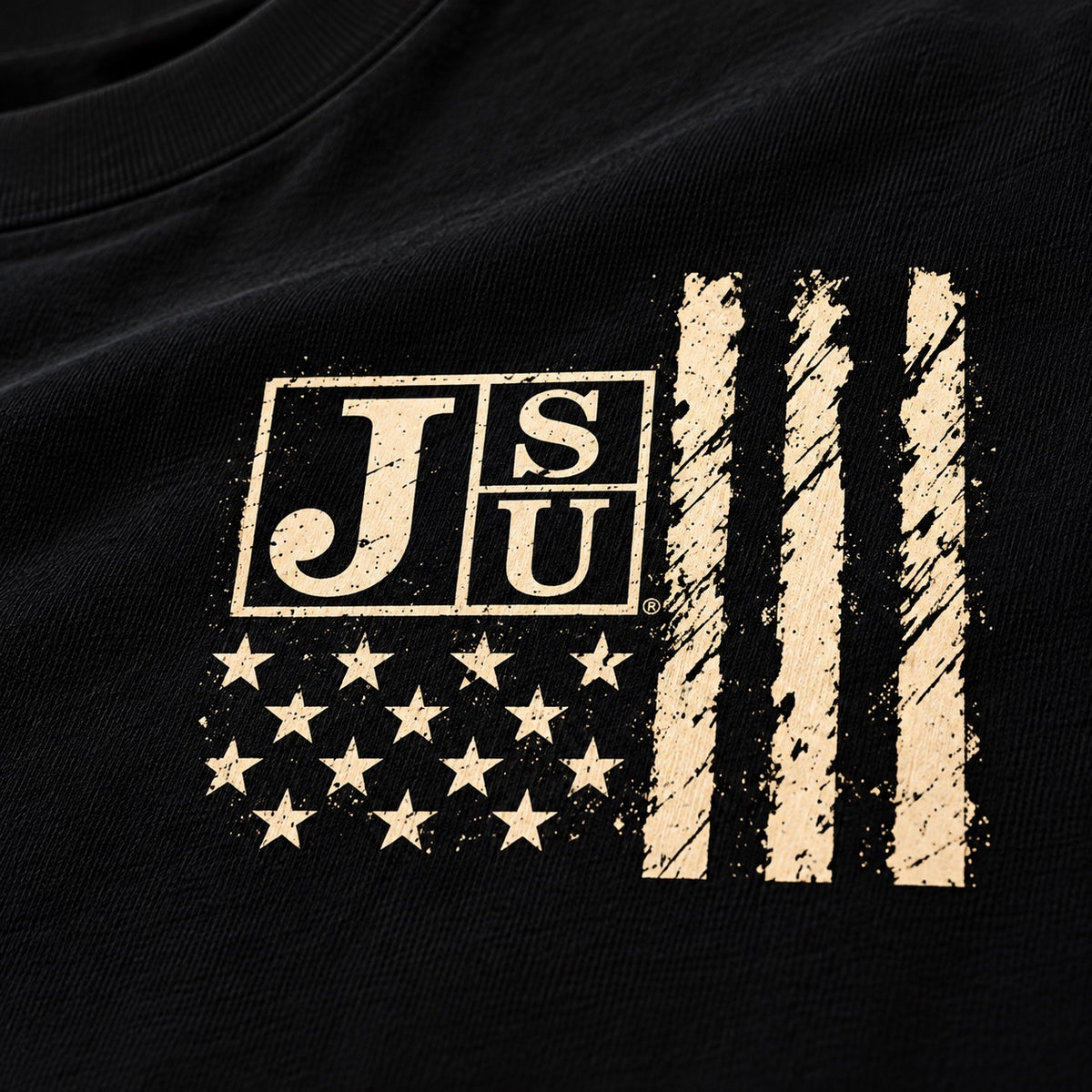 Close-up of vintage cream Jackson State JSU left chest design on black fabric