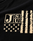 Close-up of vintage cream Jackson State JSU left chest design on black fabric