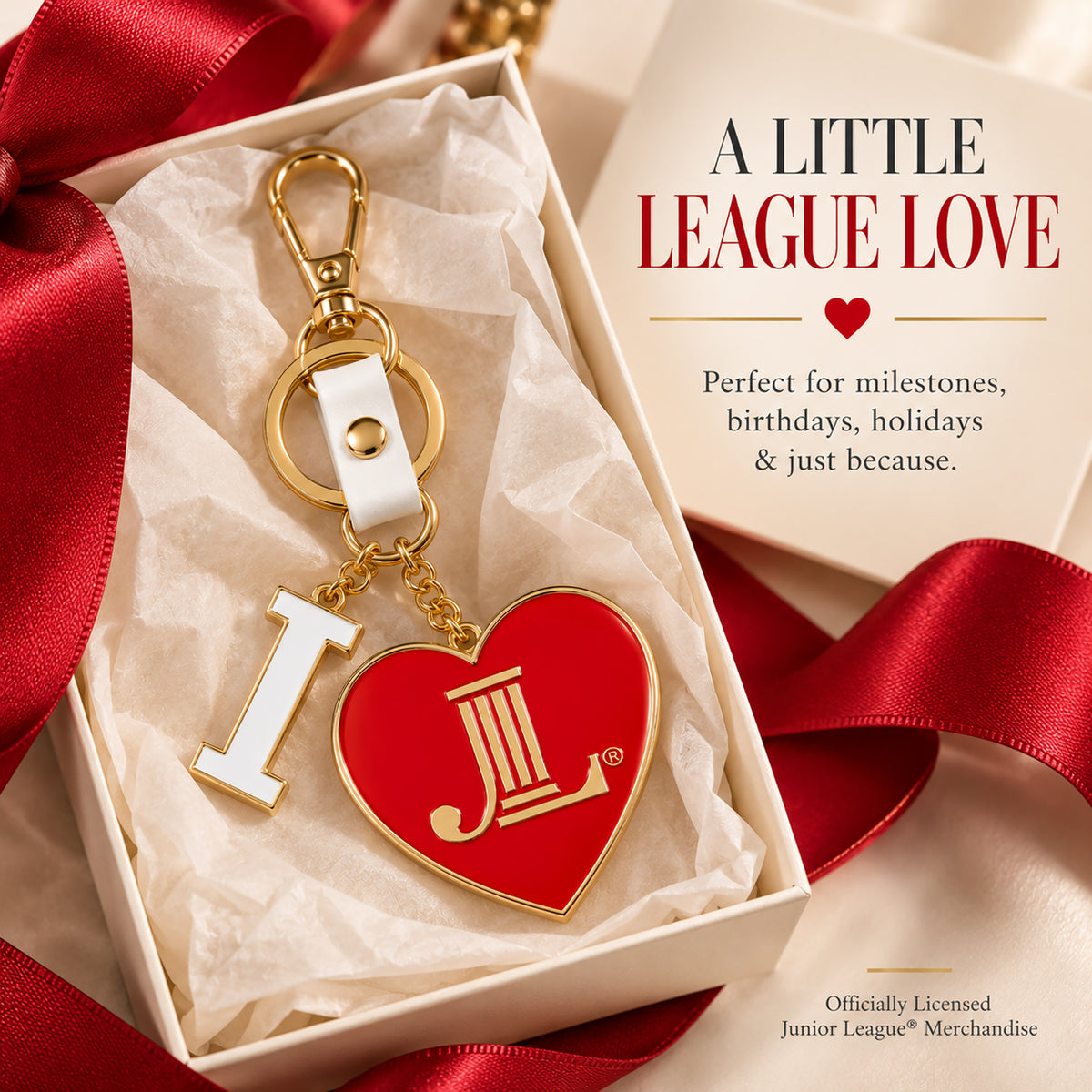 Junior League I Heart JL enamel bag charm presented in an elegant gift box with red ribbon