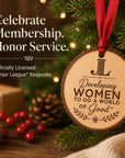 Junior League natural wood slice ornament with red ribbon and Developing Women message