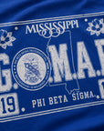 Close-up of royal blue T-shirt fabric with large G.O.M.A.B. Phi Beta Sigma print