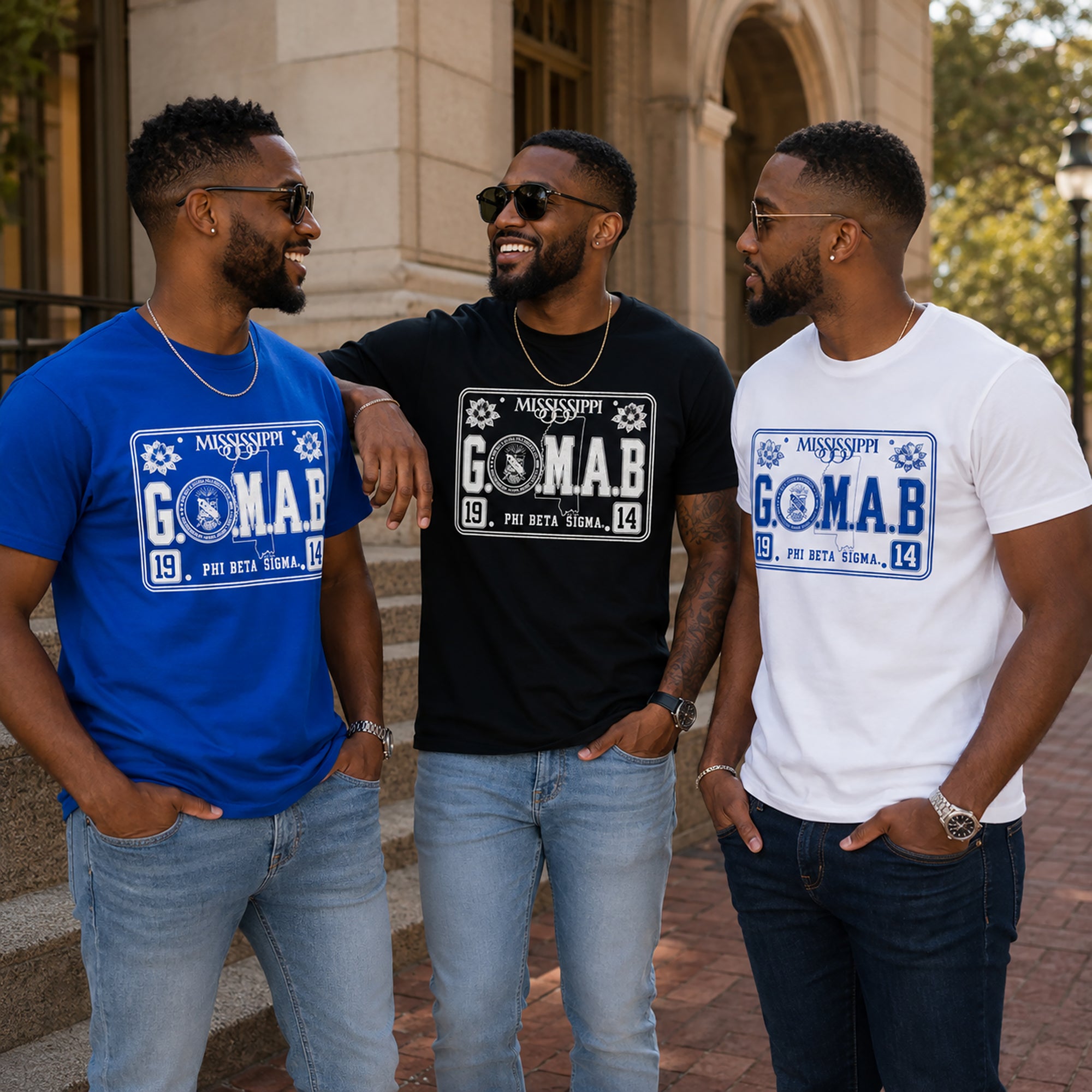 Group wearing blue, black, and white G.O.M.A.B. Phi Beta Sigma T-shirts