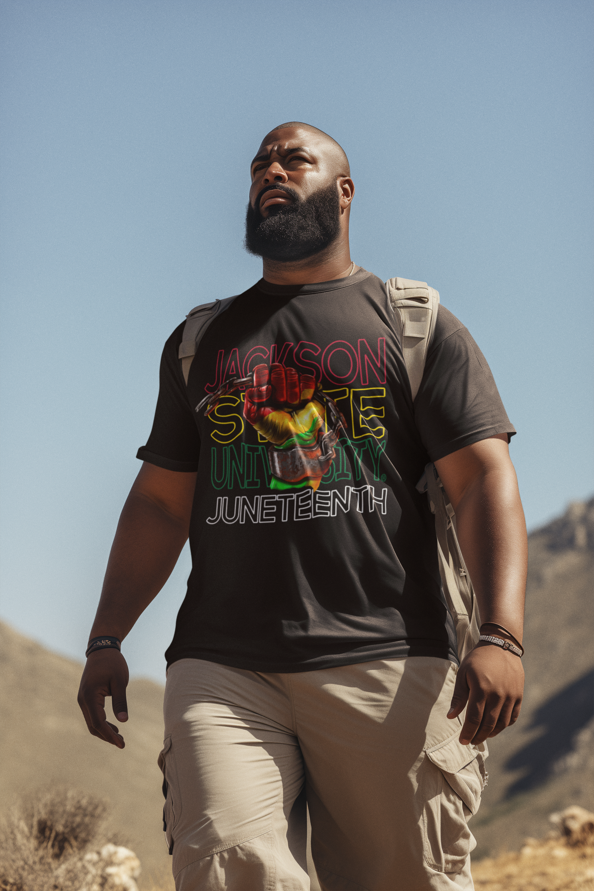 Black unisex crewneck short-sleeve T-shirt with multicolor “Juneteenth” graphic front