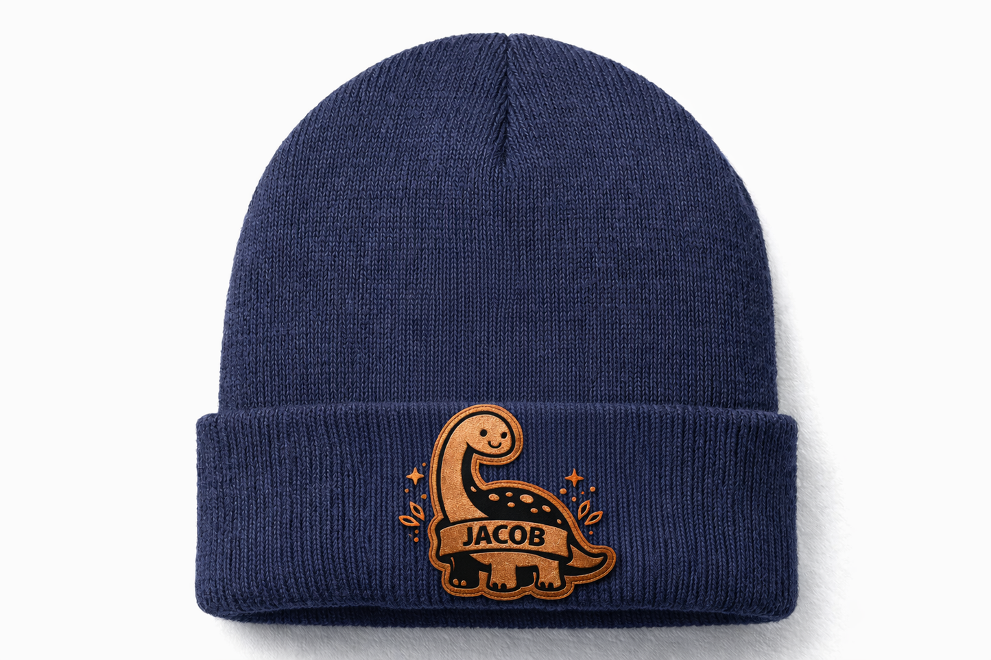 Navy blue beanie with a dinosaur design and 'Jacob' text on a white background