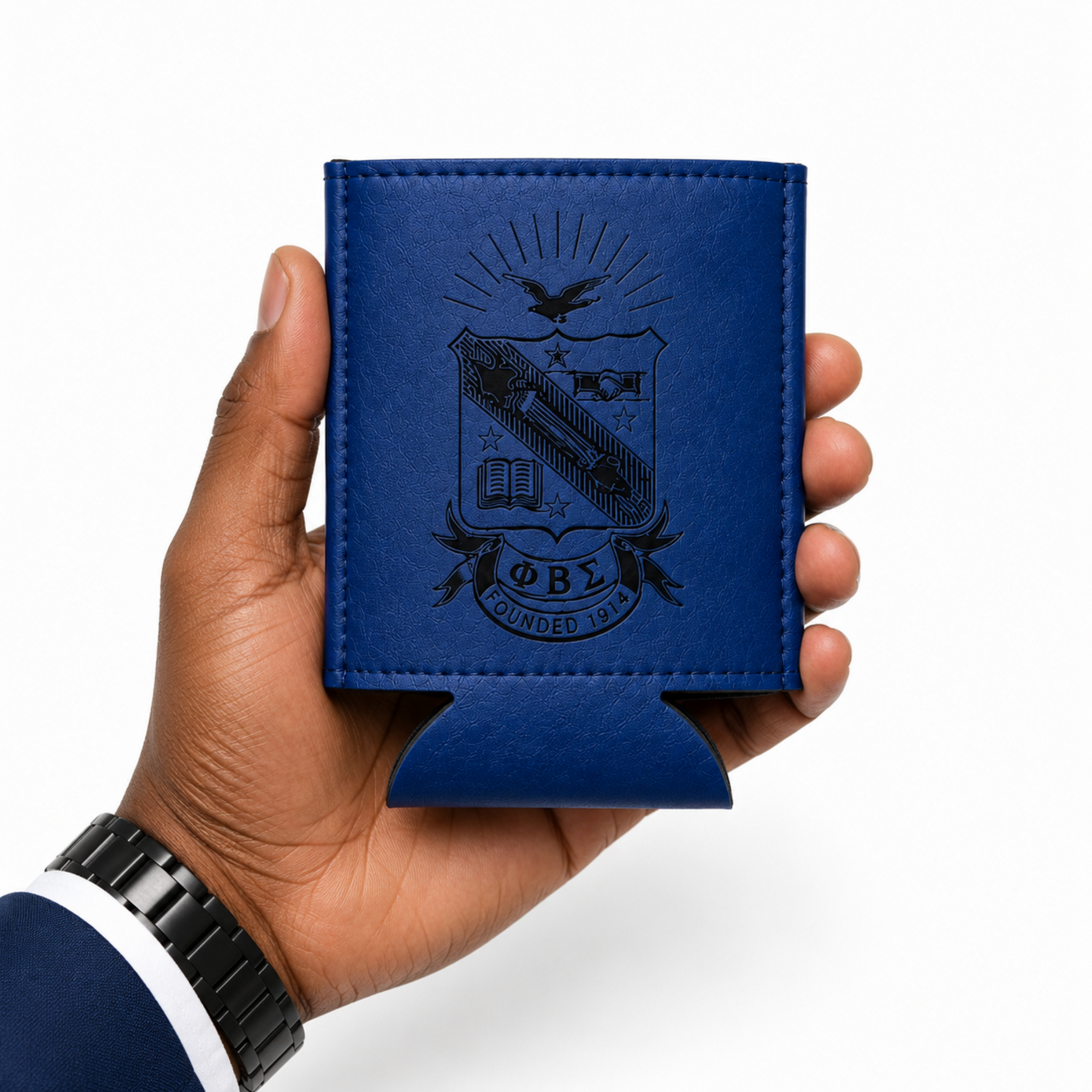 Hand holding a blue leather wallet with an embossed design on a white background